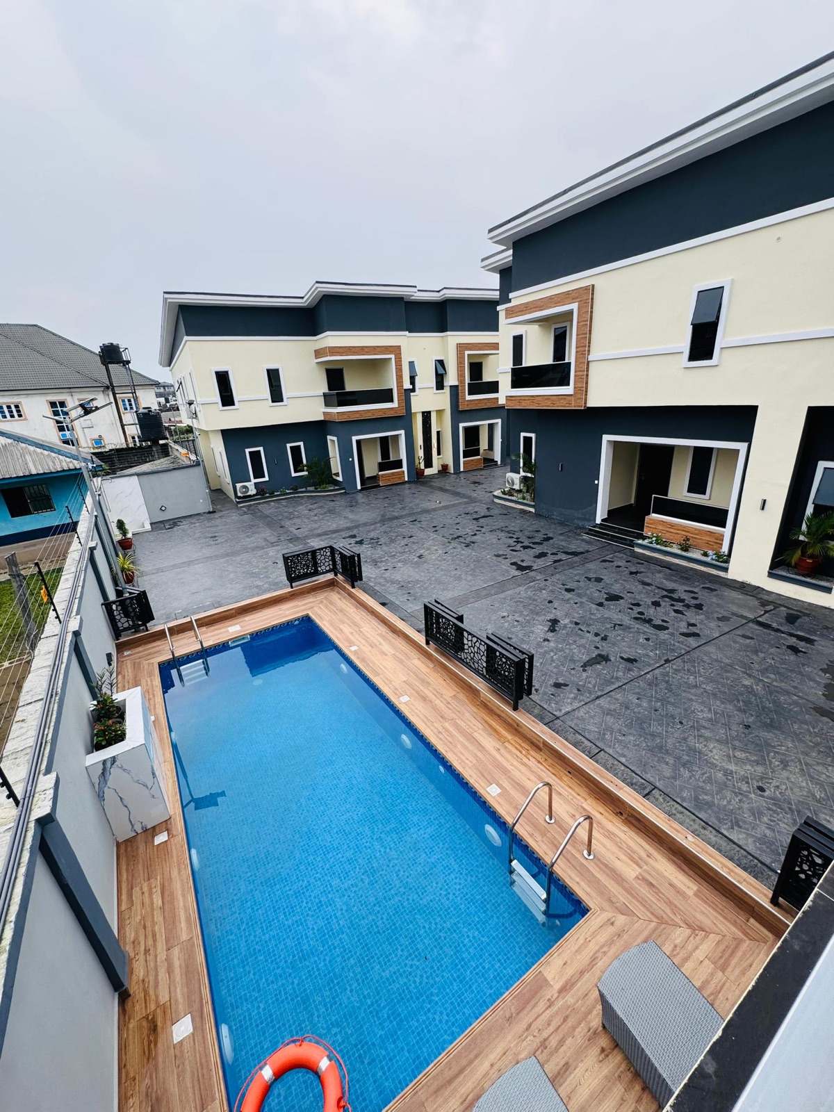 The pool and courtyard seen from an upper floor